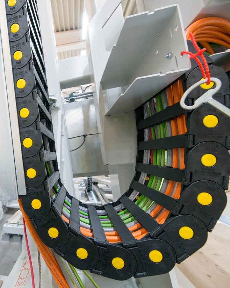 Bystronic glass manufacturing machinery using LAPP ÖLFLEX CONNECT cable chain assemblies